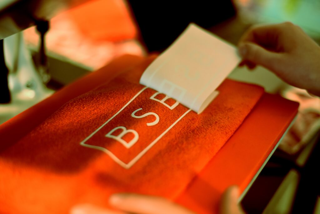SpeedyPetey applying the BSBL decal after heat pressing
