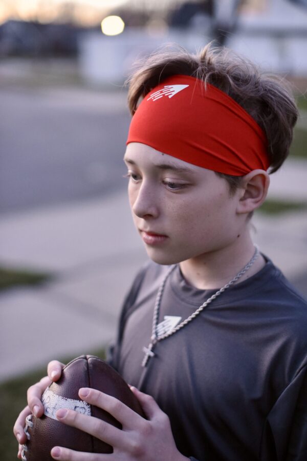 Speedy performance sports headband in red with white icon