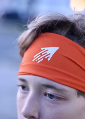 Speedy performance sports headband in orange with white icon