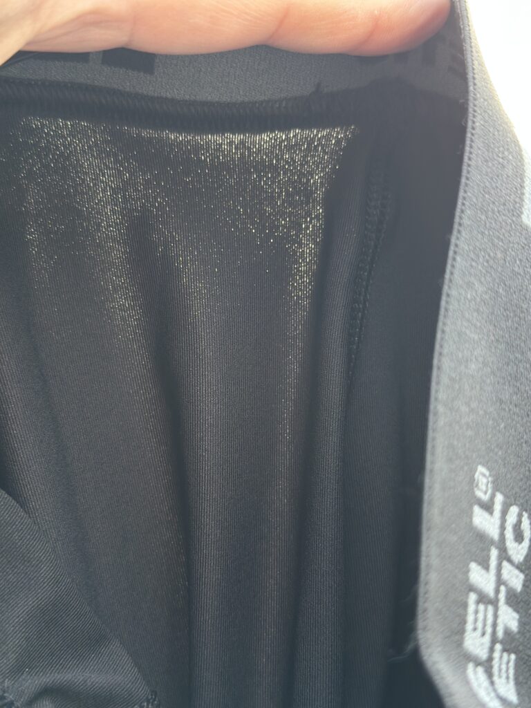 Photo of fabric with full sun behind showing thickness and quality of material