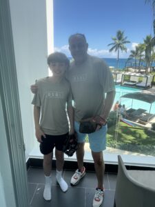 Father and son posing with the BSBL Only t-shirts in the Dominican Republic